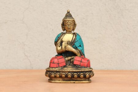 Buda con piedras incrustadas