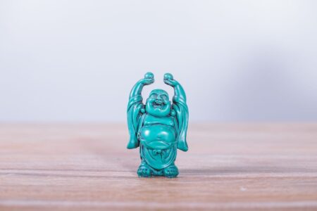 Buda sonriente turquesa