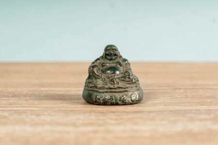 Buda feliz de bronce