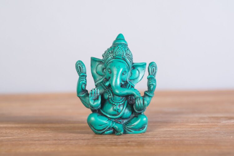 Ganesh de resina 15 cms. color turquesa