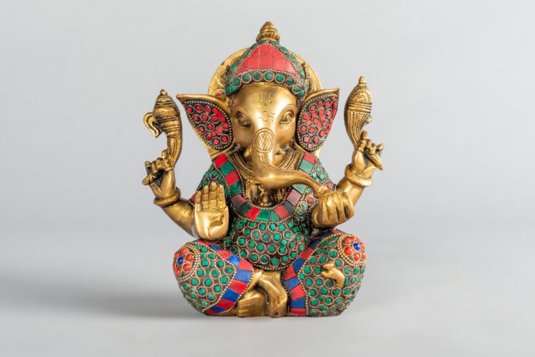 Ganesh de bronce y piedra
