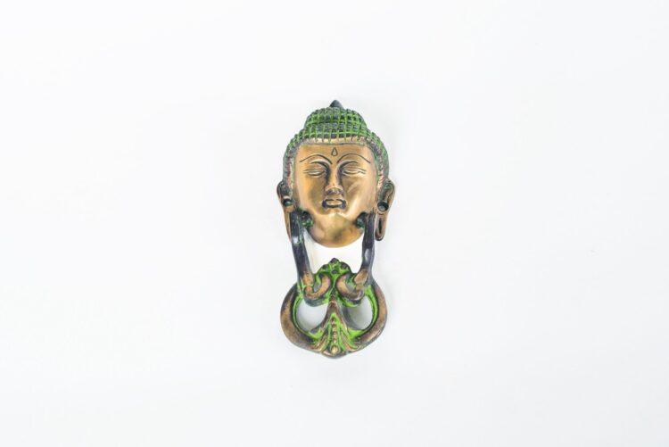 Tocapuerta de bronce buda